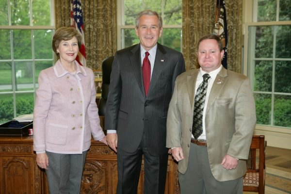 Eric Combs with President George W. Bush and First Lady Laura Bush in the Oval Office, 2006
